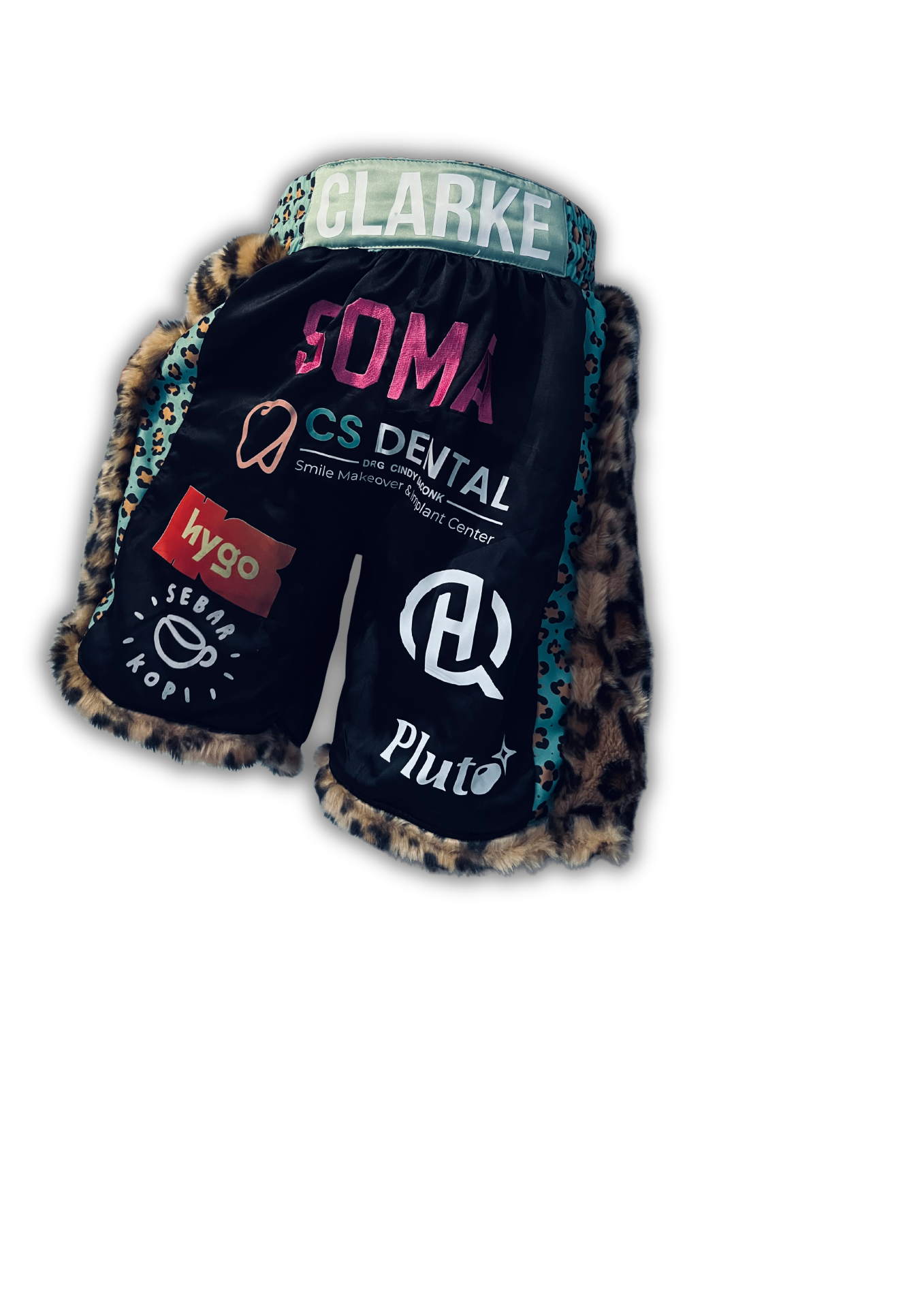 Close-up of custom chain-stitch lettering on Primal boxing trunks.