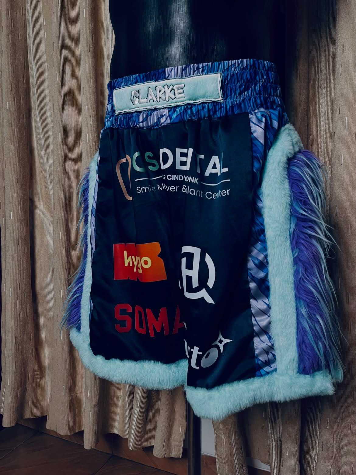 Blue Muay Thai shorts with fur trim for Aaron Clarke