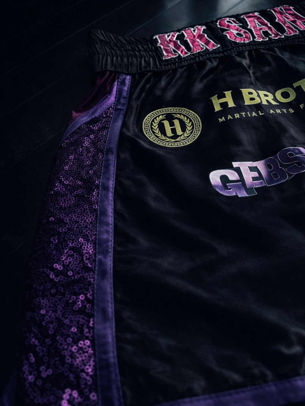 Purple sequin detail on custom KK Sam Muay Thai shorts
